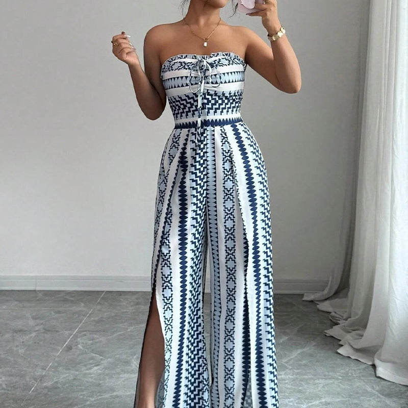 👗50% OFF NOW!💥Geometric Jumpsuit with Halter Neckline & Side Slit – Unique print & elastic back – Versatile, perfect for summer parties or resort wear ✨