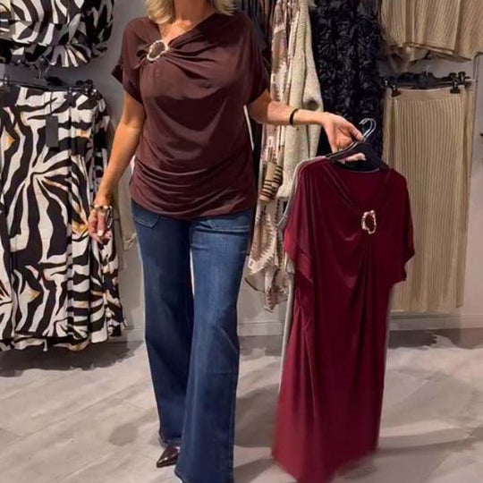 Stilingas moteriškas asimetriškos iškirptės viršus trumpomis rankovėmis