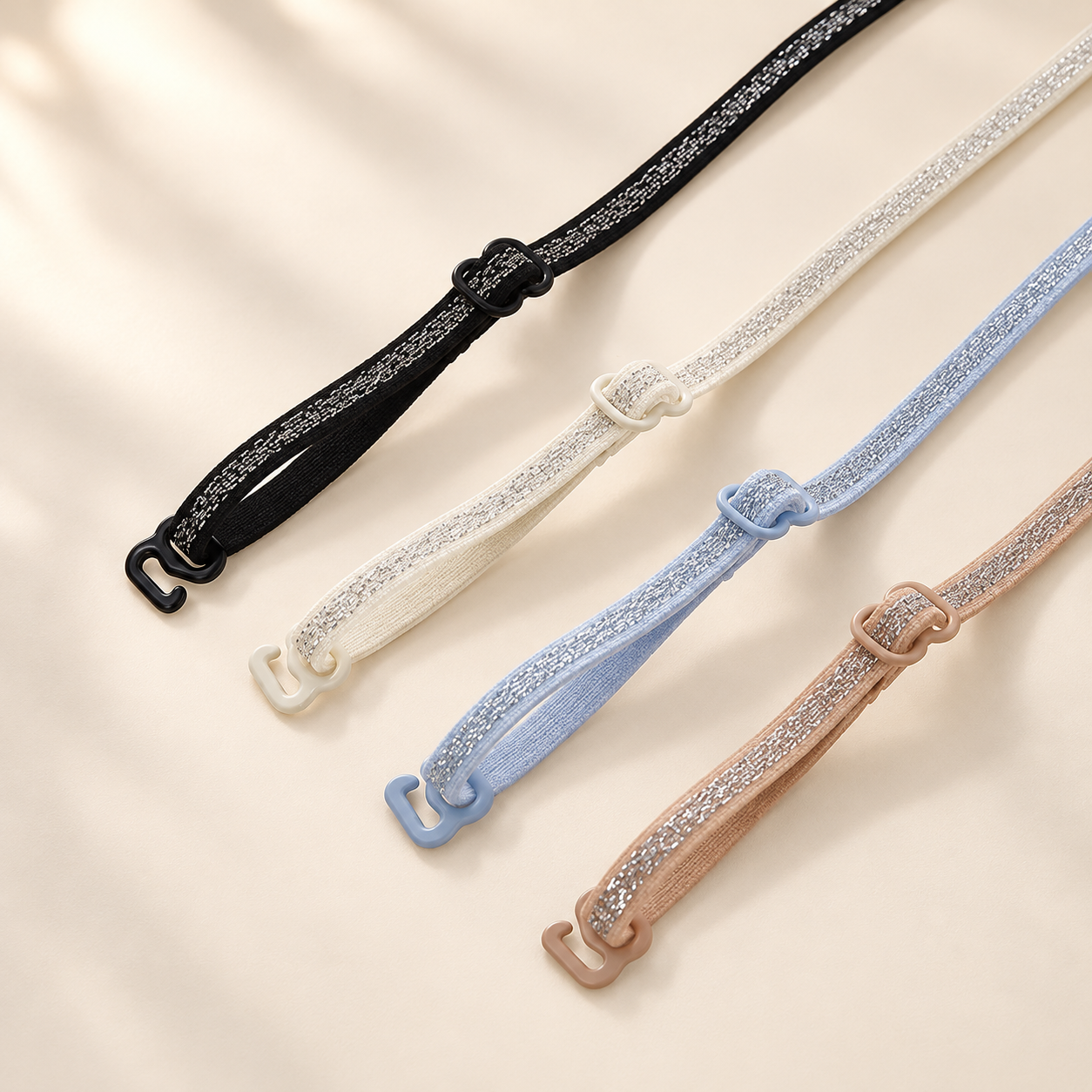 Adjustable shimmer strap hardware in four shades